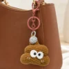 Handmade crochet poop-shaped keychain charm