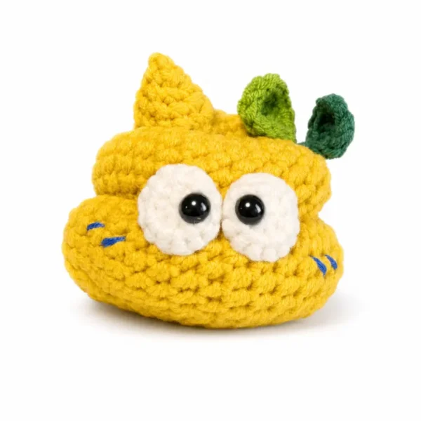 Handmade crochet poop-shaped keychain charm